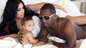 Kim Kardashian & Kanye West with their Baby
